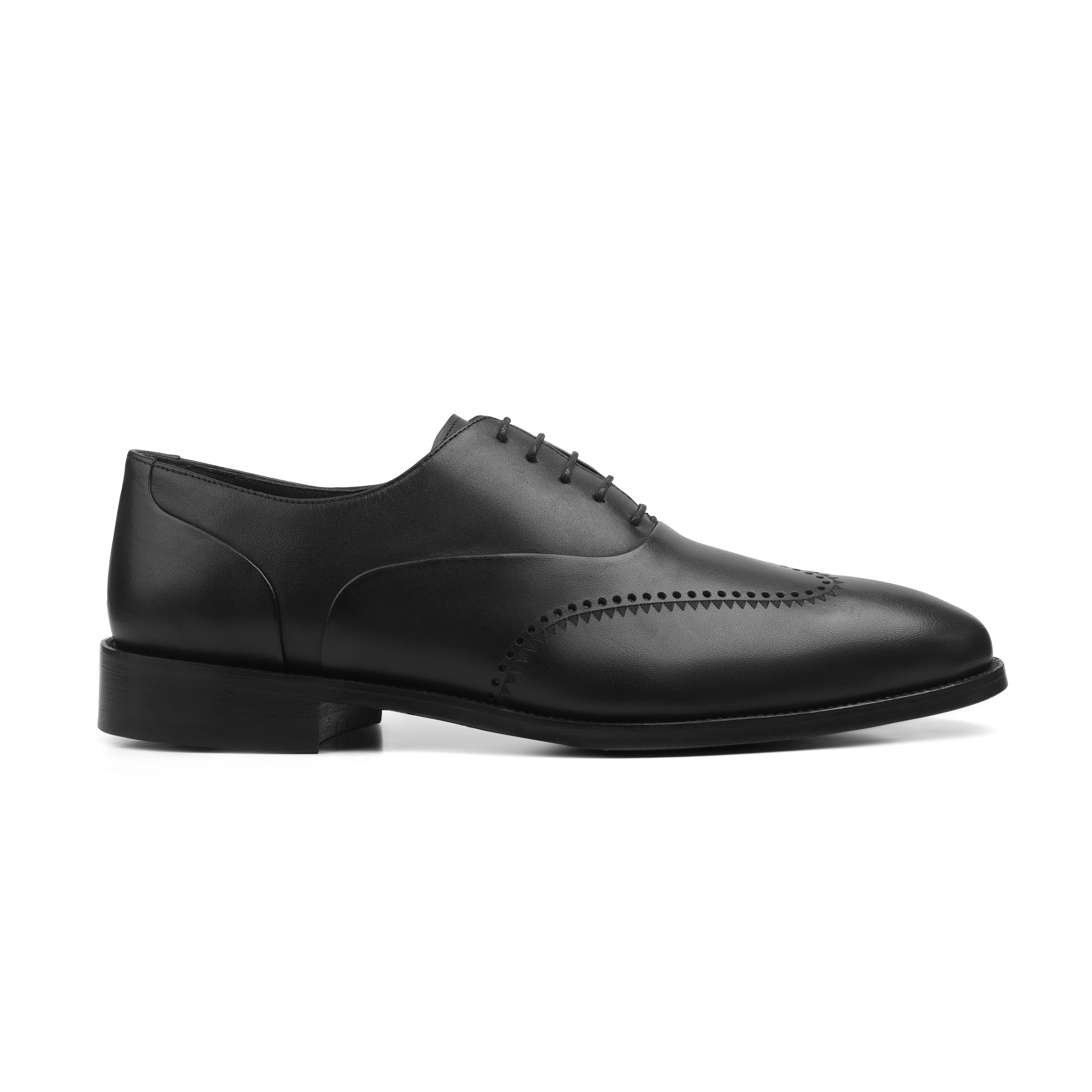 Image of Black leather dress shoe on a white background