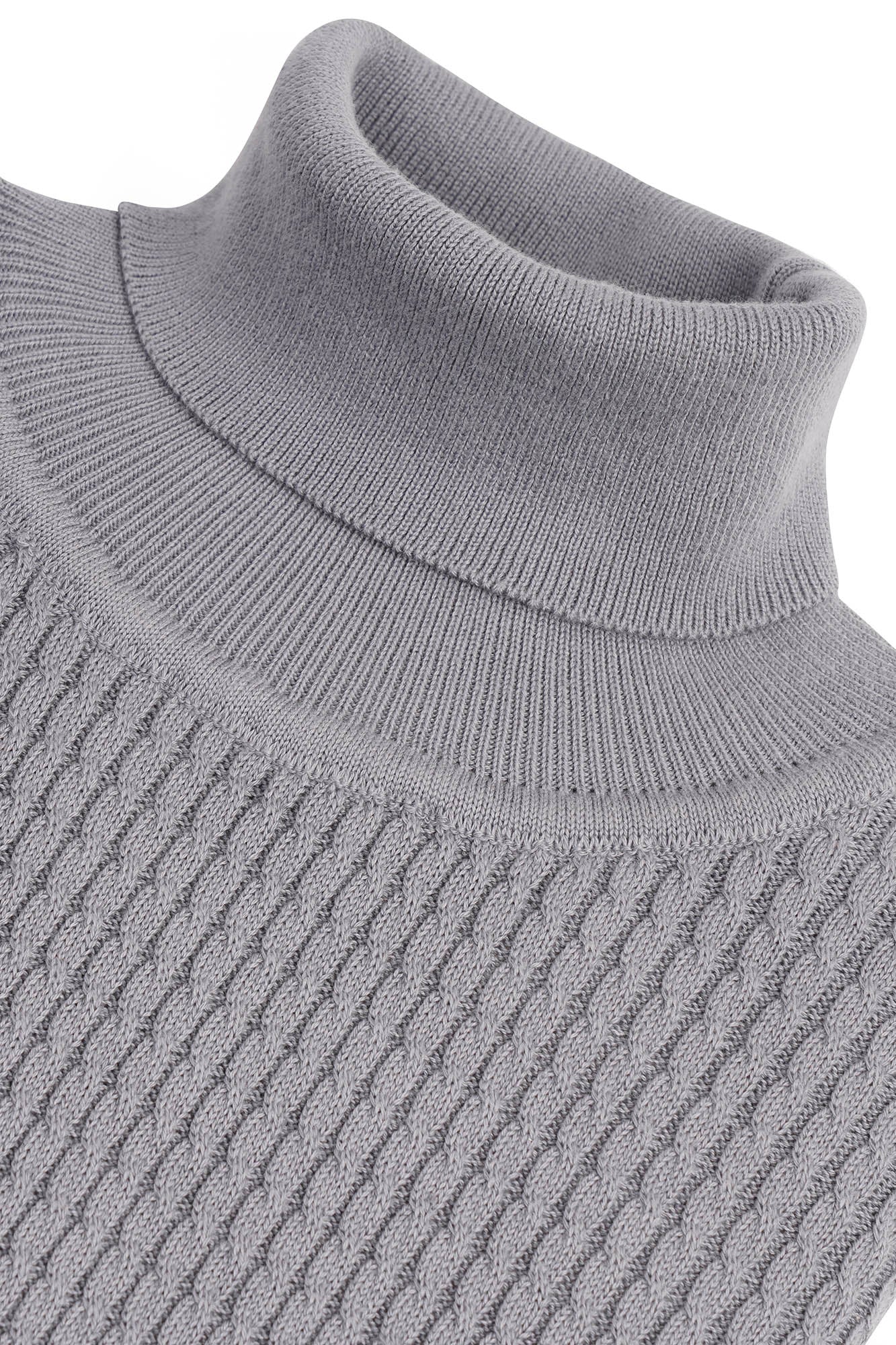 Image of Close-up of a gray turtleneck sweater on a white background
