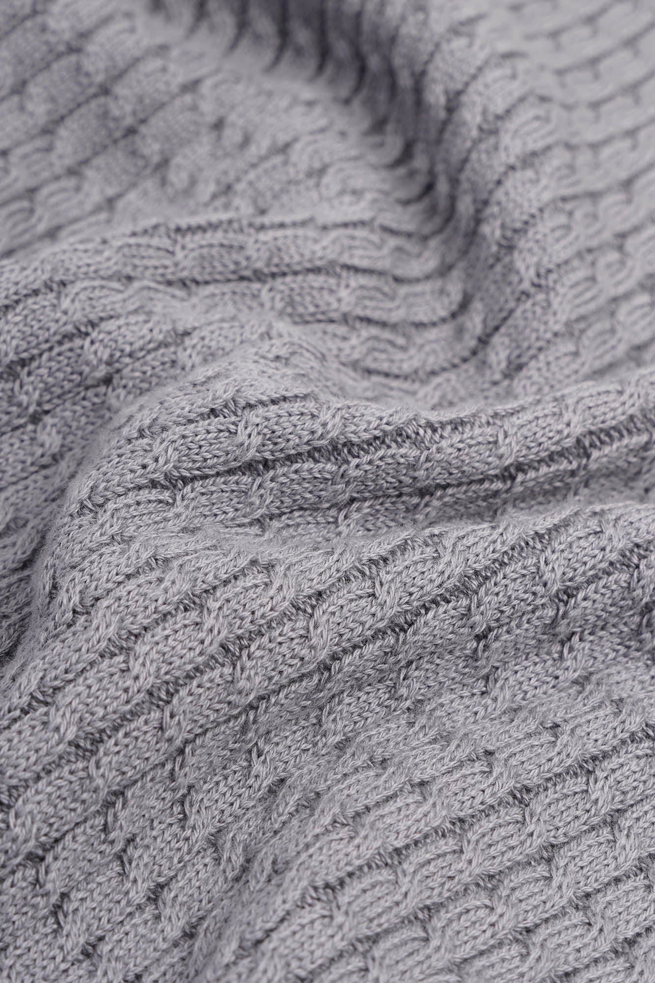 Image of Close-up of textured gray fabric with a focus on pattern and texture.