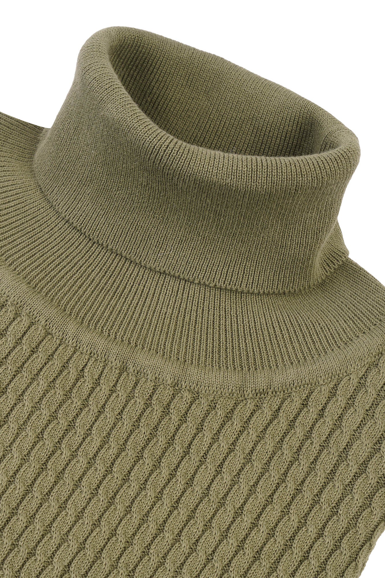 Image of Close-up of a green knitted turtleneck sweater on a white background