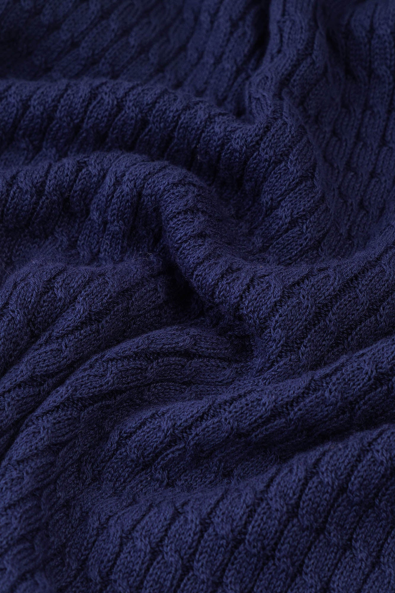 Image of Close-up of a textured navy blue fabric