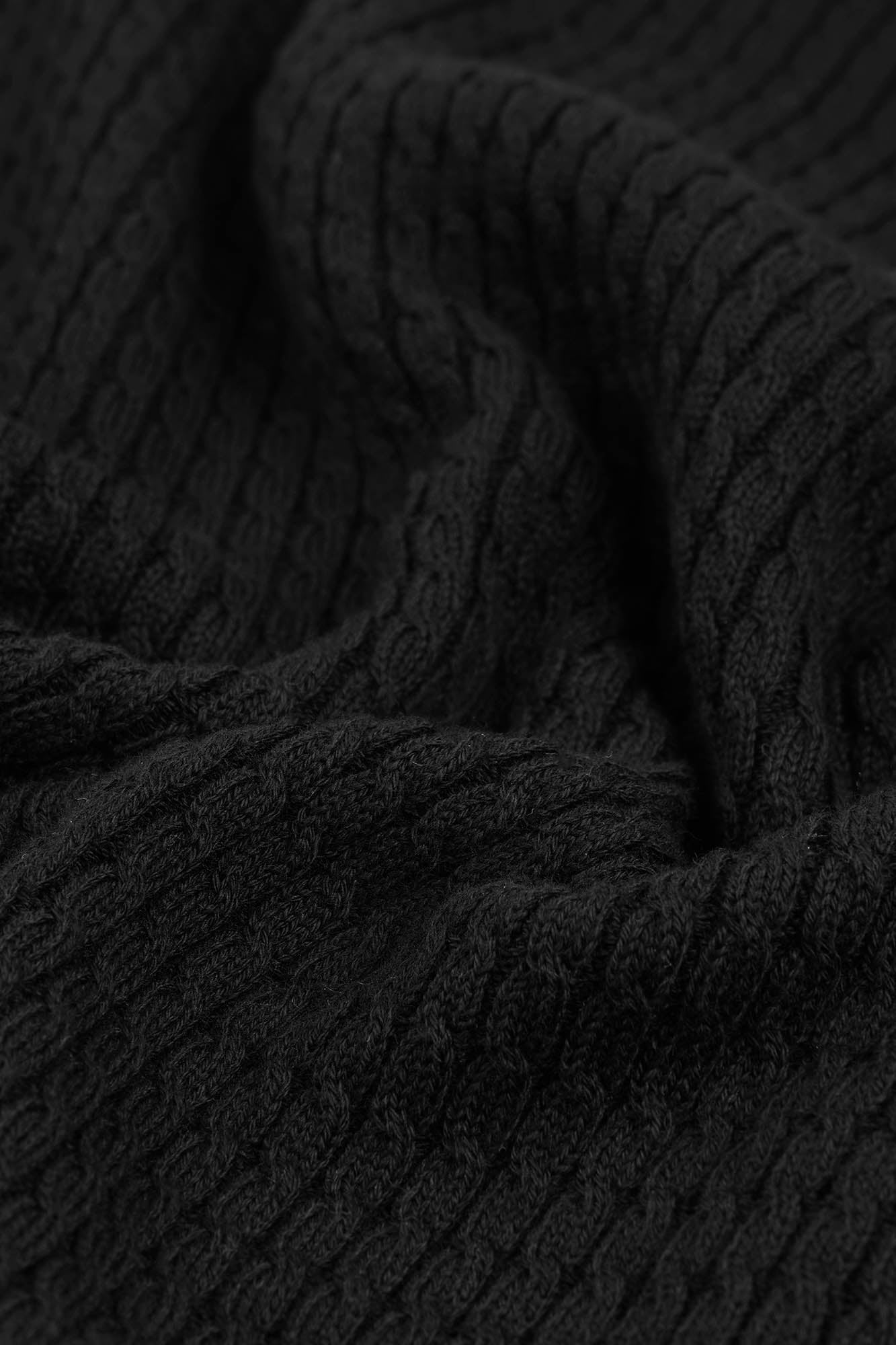 Image of Close-up of textured black fabric