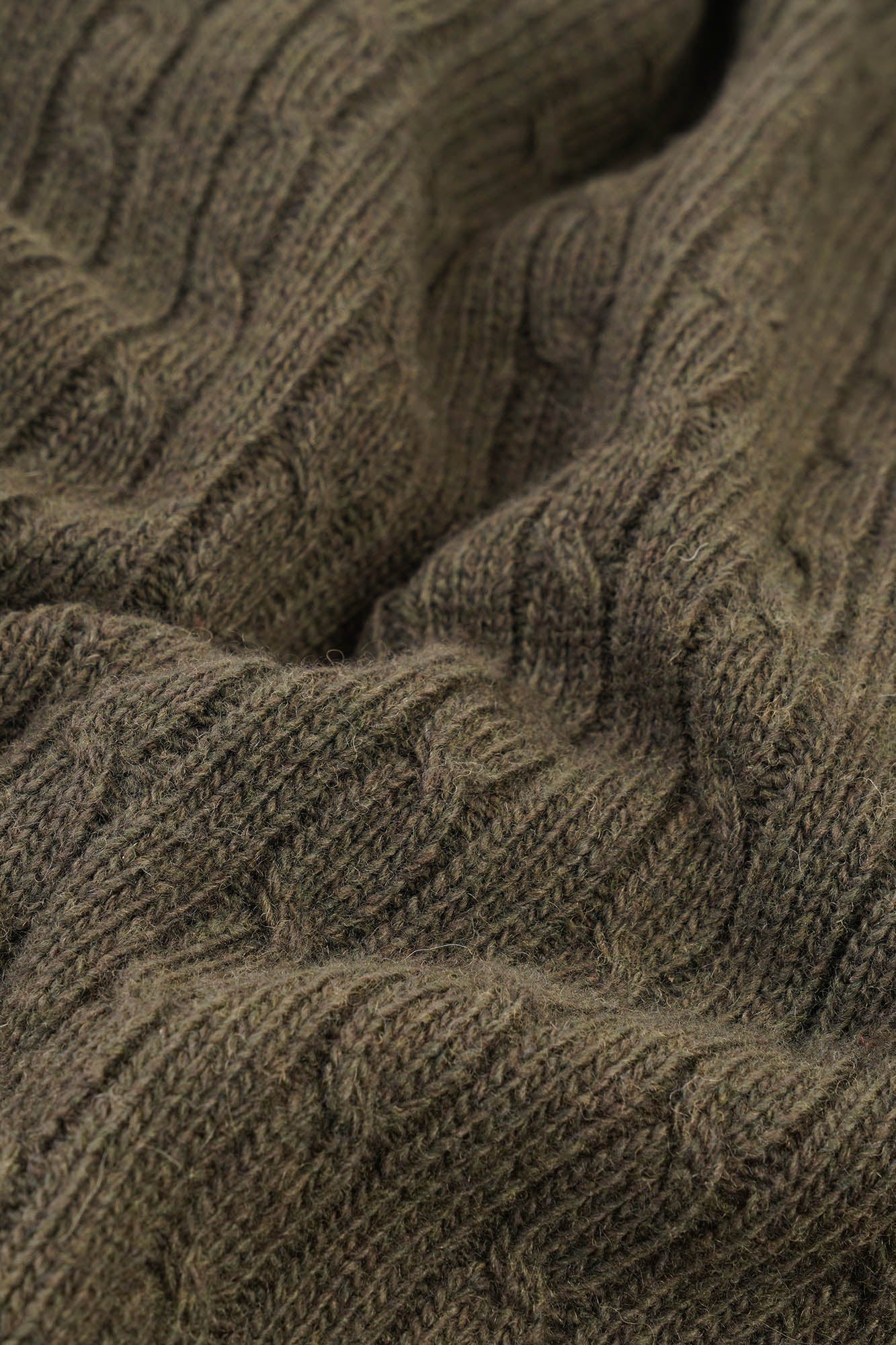 Image of Close-up of a textured brown fabric with intricate patterns