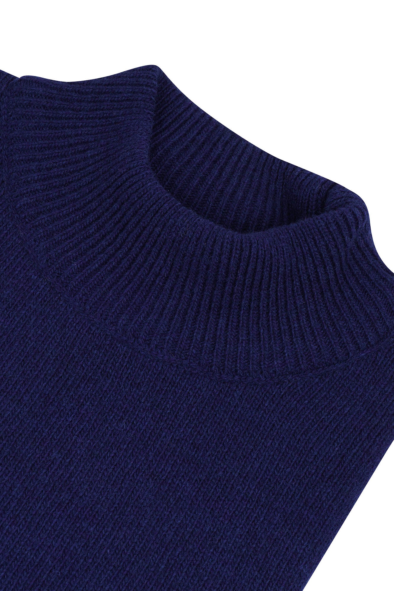 Image of Close-up of a navy blue sweater on a white background
